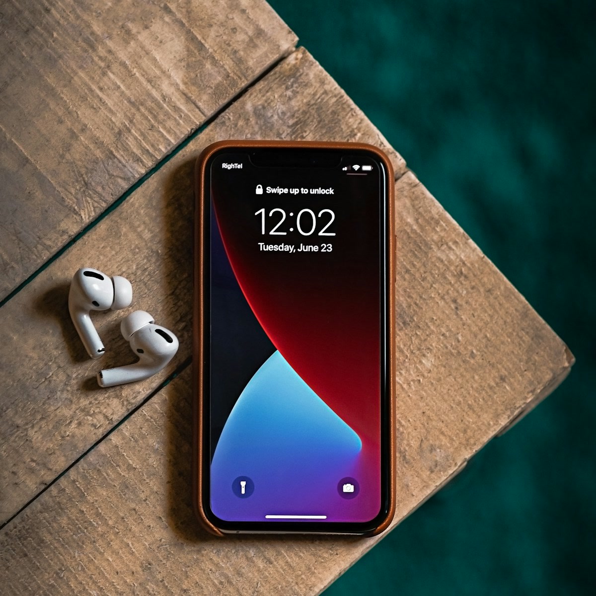 Phone + Earbuds Flat Lay